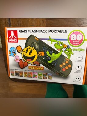 Atari Flashback Portable Handheld Console - Black with Orange Buttons. New